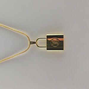 Louis Vuitton Authentic Gold Lock Pendant  18k Gold Necklace